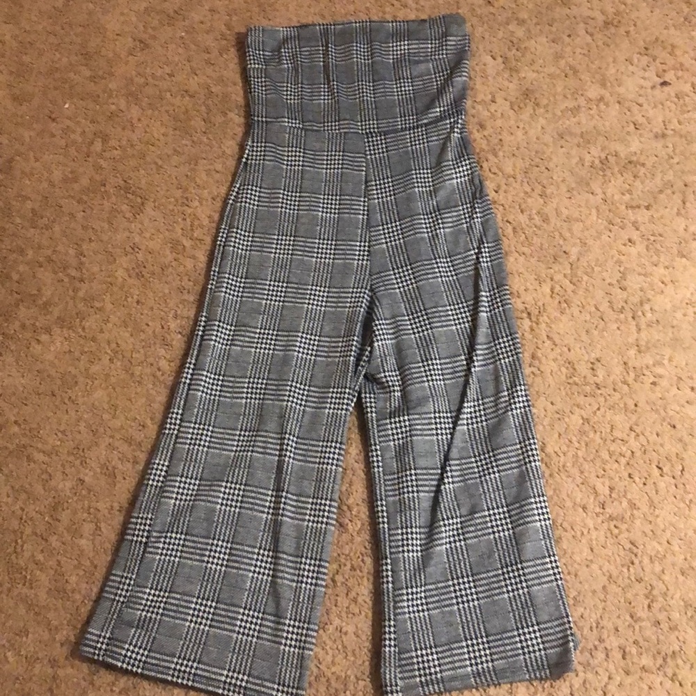 A plaid black and white jump strapless jumpsuit